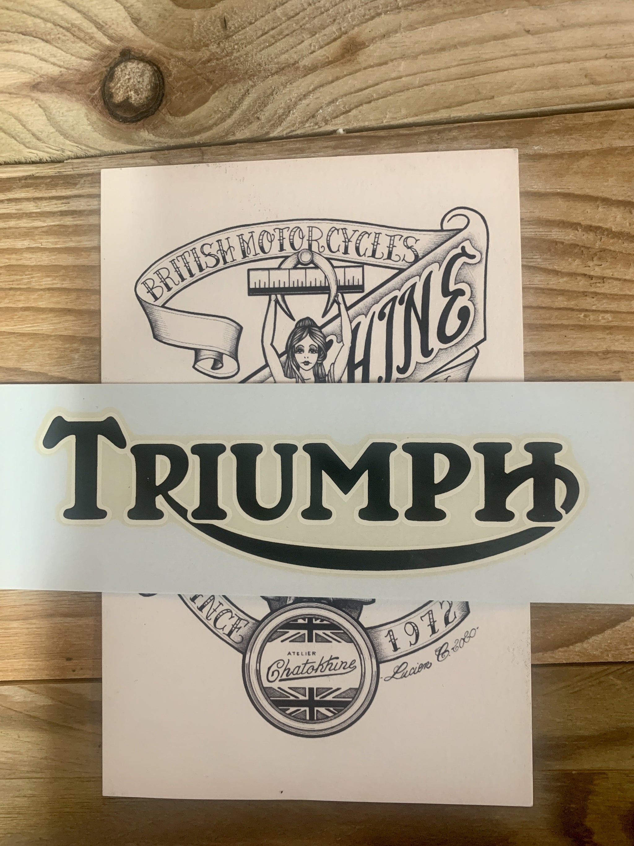 transfert Noir logo Triumph