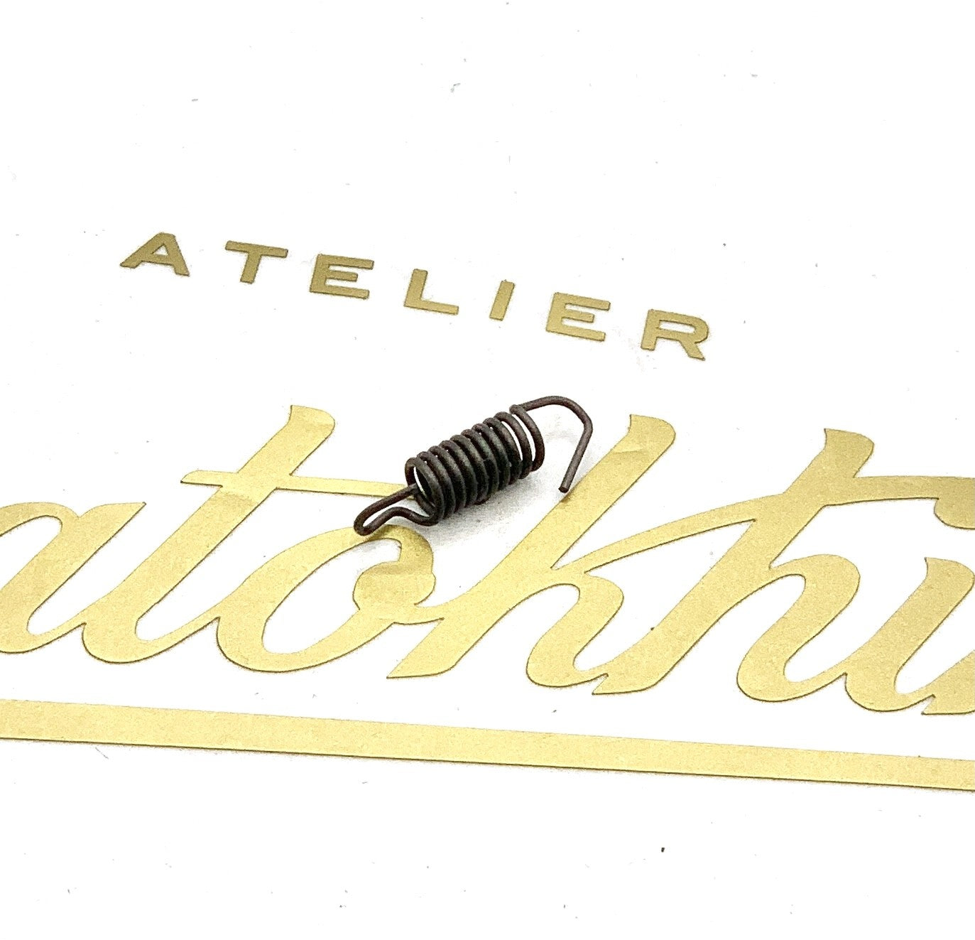 Ressort pour avance automatique magnéto