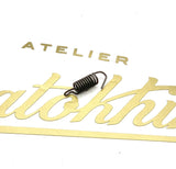 Ressort pour avance automatique magnéto